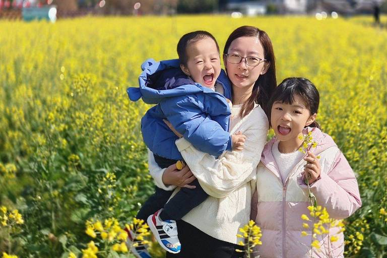 Xiao Zhuo e seus dois filhos