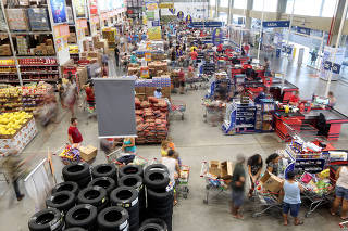 FILE PHOTO: Consumers shop at a supermarket in Sao Paulo