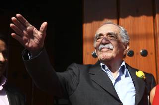 File photo of Garcia Marquez greeting journalists and neighbours on his birthday outside his house in Mexico City