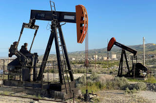 FILE PHOTO: A general view of oil drilling equipment on federal land near Fellows, California