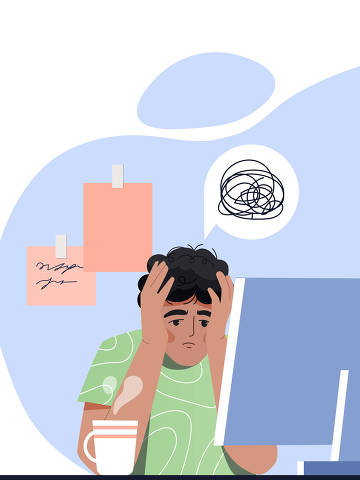 Burnout and overload. Man sits at his workplace with his head in his hands. Low energy, dead end, confused character in front of computer. Fatigue, overwork. Cartoon flat vector illustration. Credit Rudzhan /  Adobestock