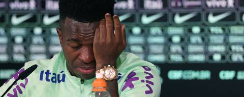 Brazil's forward Vinicius Junior cries as he gives a press conference on the eve of the international friendly football match between Spain and Brazil at the Ciudad Real Madrid training ground in Valdebebas, outskirts of Madrid, on March 25, 2024. Spain arranged a friendly against Brazil at the Santiago Bernabeu under the slogan 