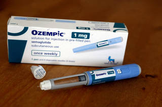 FILE PHOTO: A box of Ozempic and contents sit on a table in Dudley