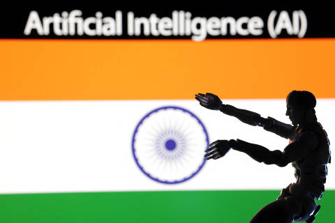 AI Artificial intelligence words, miniature of robot and an Indian flag are seen in this illustration taken December 21, 2023. REUTERS/Dado Ruvic/Illustration ORG XMIT: PPP-DAD01