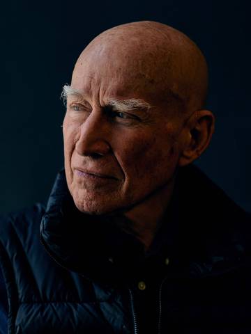 Brazilian photographer Sebastiao Salgado poses for a portrait for AFP at Somerset House in London on April 18, 2024. The Brazilian photographer Sebastiao Salgado, 80, who is presenting in London a retrospective of his work, explains in an interview with the AFP that people must be 