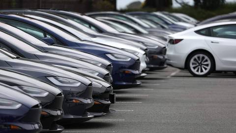 (FILES) Brand new Tesla cars are displayed on the sales lot at a Tesla dealership on May 16, 2023 in Colma. Electric car maker Tesla has initiated a recall of about two million vehicles in the United States over a risk linked to its autopilot software, the US traffic safety regulator said on December 13, 2023. 