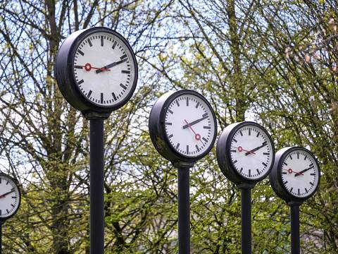 Clocks of the art installation 'Zeitfeld' (time field) by German artist Klaus Rinke are seen in Duesseldorf, western Germany, on March 28, 2024. Clocks in Germany will be changed to summer time and set back by one hour on Sunday, March 31, 2024. (Photo by Ina FASSBENDER / AFP)