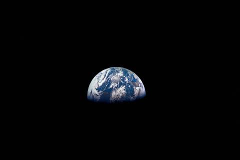  (21-27 Dec. 1968) --- View of Earth as photographed by the Apollo 8 astronauts on their return trip from the moon. Note that the terminator is straighter than on the outbound pictures. The terminator crosses Australia. India is visible. The sun reflection is within the Indian Ocean.