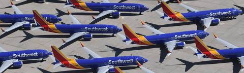 (FILES) Southwest Airlines Boeing 737 MAX aircraft are parked on the tarmac after being grounded, at the Southern California Logistics Airport in Victorville, California, on March 28, 2019. Troubled aviation giant Boeing reported a first-quarter loss of $343 million on April 24, 2024, reflecting recent safety troubles that have slowed production and deliveries. Boeing said it tempered production in the 737 program following a January near-catastrophic incident on an Alaska Airlines jet. The company is implementing a 