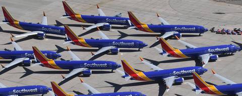 (FILES) Southwest Airlines Boeing 737 MAX aircraft are parked on the tarmac after being grounded, at the Southern California Logistics Airport in Victorville, California, on March 28, 2019. Troubled aviation giant Boeing reported a first-quarter loss of $343 million on April 24, 2024, reflecting recent safety troubles that have slowed production and deliveries. Boeing said it tempered production in the 737 program following a January near-catastrophic incident on an Alaska Airlines jet. The company is implementing a 