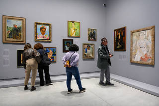 Paintings by 20th-century artists hang cheek by jowl in the Central Pavilion of the 2024 Venice Biennale in Venice, Italy on Thursday, April 18, 2024. (Casey Kelbaugh/The New York Times)
