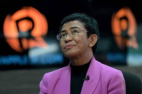 (FILES) This file photo taken on January 18, 2023 shows Nobel Laureate Maria Ressa talking during an interview with AFP at Rappler offices in Pasig, Metro Manila. A foreign ownership case against Philippine Nobel laureate Maria Ressa has been dropped, her media outlet said on December 13, 2023, but the journalist still faces the threat of imprisonment on other charges. (Photo by JAM STA ROSA / AFP)