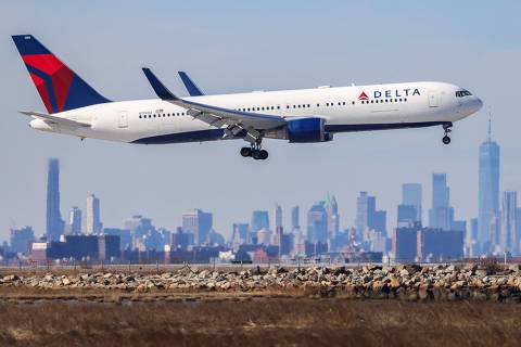 (FILES) A Delta Airline Boeing 767 passenger aircraft arrives from Dublin at JFK International Airport in New York on February 7, 2024. Delta Air Lines reported another round of strong earnings on April 10, 2024, as it forecast a record second quarter based on consistently strong travel appetite. (Photo by Charly TRIBALLEAU / AFP)