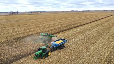 MCINTIRE, IOWA - OCTOBER 31: An aerial view shows workers from Pinicon Farm harvesting corn on October 31, 2023 near McIntire, Iowa. With more than 75% of the states corn harvested, Iowa farmers are expected to see one of their best years for crop yields despite the vast majority of the state suffering from some level of drought. These yields can be partially attributed to corn hybrids which are much better adapted to dry conditions than they were just a couple of decades ago.   Scott Olson/Getty Images/AFP (Photo by SCOTT OLSON / GETTY IMAGES NORTH AMERICA / Getty Images via AFP)