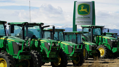 FILE PHOTO: John Deere tractors are seen for sale at a dealer in Longmont, Colorado, U.S., February 21, 2017. REUTERS/Rick Wilking/File Photo ORG XMIT: FW1