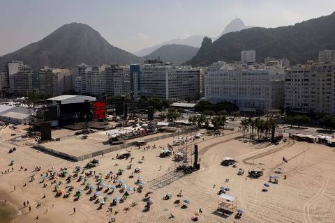 Aerial view of Copacabana beach where the stage for the show of US pop star Madonna is being set up in Rio de Janeiro, Brazil, on April 29, 2024. Madonna will perform a free mega-concert on May 4 on Rio de Janeiro's Copacabana beach to close her 'Celebration' tour. (Photo by Pablo PORCIUNCULA / AFP)