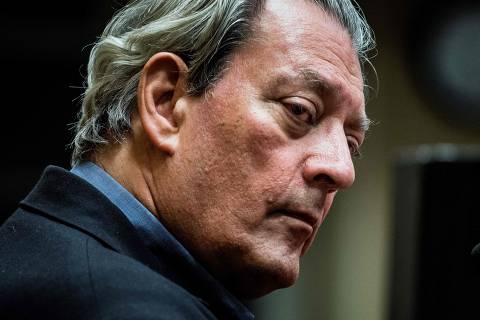 (FILES) In this file photo taken on January 16, 2018, US writer Paul Auster looks on in Lyon. - The 44-year-old son of acclaimed US novelist Paul Auster has died, New York police said on April 28, 2022, just over a week after he was charged in the death of his baby daughter. Daniel Auster died of an accidental drug overdose, the New York Post reported. The New York Police Department told AFP that Auster was found unconscious on a subway platform in Brooklyn on April 20. (Photo by JEFF PACHOUD / AFP)