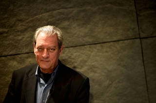 FILE PHOTO: U.S. author Auster poses before the presentation of the Spanish translation of his latest novel 4 3 2 1 in Bilbao