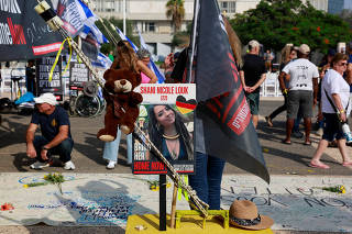 Families and supporters of hostages call for a dialogue with Israeli PM Netanyahu and Defence Minister Gallant, in Tel Aviv