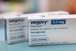FILE PHOTO: FILE PHOTO: Boxes of Wegovy made by Novo Nordisk are seen at a pharmacy in London