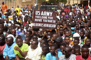 FILE PHOTO: Nigeriens demonstrate to protest against the U.S. military presence in Niamey