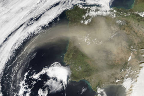 In a satellite image provided by NASA/Goddard/Jeff Schmaltz/MODIS Land Rapid Response Team, Saharan dust over the Iberian Peninsula, captured in a photo from the Aqua satellite in 2016. Three long-running satellites will soon be switched off, forcing scientists to figure out how to adjust their views of our changing planet. (NASA/Goddard/Jeff Schmaltz/MODIS Land Rapid Response Team via The New York Times) ? NO SALES; EDITORIAL USE ONLY ? ORG XMIT: XNYT0189 DIREITOS RESERVADOS. NÃO PUBLICAR SEM AUTORIZAÇÃO DO DETENTOR DOS DIREITOS AUTORAIS E DE IMAGEM