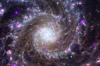 An image of a spiral galaxy like our own Milky Way, known as Messier 74