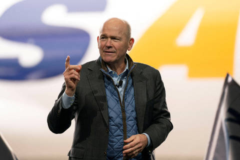 FILE PHOTO: Dave Calhoun, CEO of Boeing, speaks on stage during the delivery of the final 747 jet at their plant in Everett, Washington, U.S. January 31, 2023.  REUTERS/David Ryder/File Photo ORG XMIT: FW1