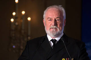 FILE PHOTO: Actor Bernard Hill speaks during a news conference in Hong Kong