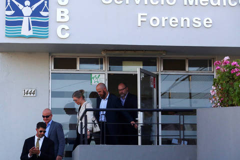Members of the United States and Australian embassies and the parents of missing U.S. and Australian tourists leave the Forensic Medical Service (Servicio Medico Forense) after the parents identified that the three bodies found earlier are their children's, in Ensenada, Mexico, May 5, 2024. REUTERS/Jorge Duenes ORG XMIT: GGGHNR06