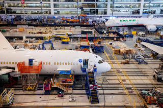 FILE PHOTO: Boeing employees assemble 787s inside their main assembly building on their campus in North Charleston, South Carolina