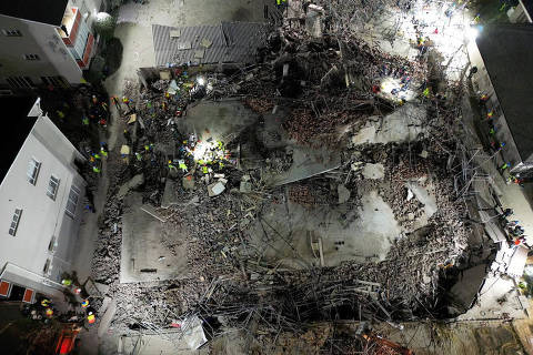 A drone view of the scene of a building collapse where several construction workers are thought to be trapped in George, South Africa May 6, 2024. REUTERS/Shafiek Tassiem ORG XMIT: GPD