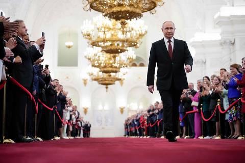 TOPSHOT - Russian president-elect Vladimir Putin walks prior to his inauguration ceremony at the Kremlin in Moscow on May 7, 2024. (Photo by Alexander Zemlianichenko / POOL / AFP) ORG XMIT: XPAG121