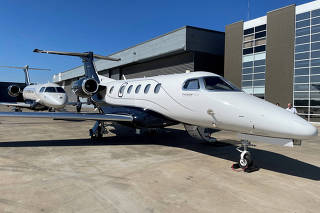 FILE PHOTO: Embraer's Phenom 300E and Praetor 600 executive aircraft are seen at the Catarina Airport in Sao Roque