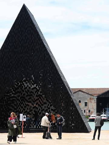 Visitors look at the installation 