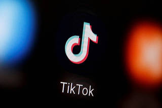 FILE PHOTO: A TikTok logo is displayed on a smartphone in this illustration