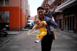 FILE PHOTO: In aging China, a call for 'bold' steps to cut cost of having babies