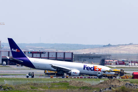 A general view of a FedEx Airlines Boeing 767 BA.N cargo plane, that landed at Istanbul Airport on Wednesday without deploying its front landing gear but managed to stay on the runway and avoid casualties, on a runway in Istanbul, Turkey, May 8, 2024. REUTERS/Umit Bektas ORG XMIT: PPP-ANK02
