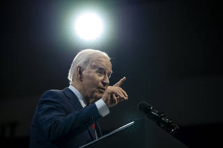 President Joe Biden discusses his administration?s efforts to replace lead pipes and other infrastructure projects at a convention center in Wilmington, N.C., on May 2, 2024. (Haiyun Jiang/The New York Times)