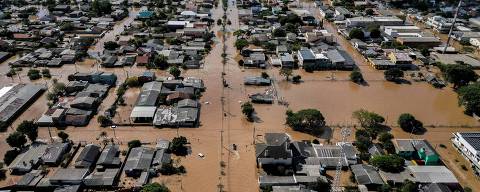 TOPSHOT - Aerial view of floods in Eldorado do Sul, Rio Grande do Sul state, Brazil, taken on May 9, 2024. Some 400 municipalities have been affected by the worst natural calamity ever to hit the state of Rio Grande do Sul, with hundreds of people injured and more than 160,000 forced from their homes. (Photo by Nelson ALMEIDA / AFP)