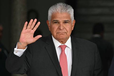 Panama's president-elect Jose Raul Mulino wave to the media before his official meeting with president Laurentino Cortizo at the Presidential Palace in Panama city May 7, 2024. (Photo by MARTIN BERNETTI / AFP)