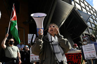 Students and workers hold a pro-Palestinian rally near MIT's Stata Center