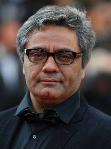 (FILES) Iranian director Mohammad Rasoulof poses as he arrives on May 27, 2017 for the 'Un Certain Regard' prize ceremony at the 70th edition of the Cannes Film Festival in Cannes, southern France. An Iranian court has sentenced the prominent filmmaker Rasoulof to jail time for 