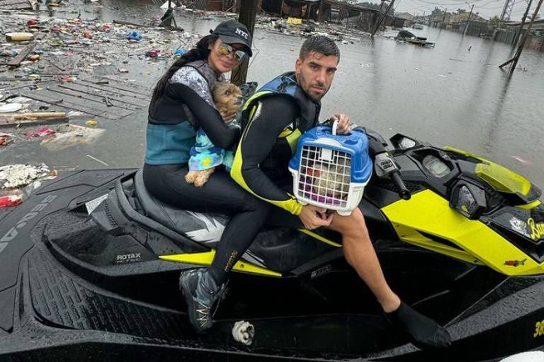 Carol Nakamura e Guilherme Leonel auxiliam no resgate de animais no Rio Grande do Sul