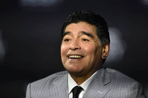 (FILES) This file photo taken on January 09, 2017 shows former Argentine football player Diego Maradona posing as he arrives for The Best FIFA Football Awards 2016 ceremony in Zurich. Maradona has signed to be the new coach of Al-Fujairah SC in the United Arab Emirates, the football club announced on May 7, 2017. / AFP PHOTO / MICHAEL BUHOLZER