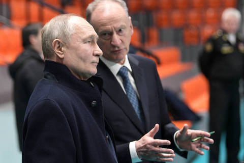 Russian President Vladimir Putin listens to Security Council's Secretary Nikolai Patrushev as they visit a sports hall of the St. Petersburg State Marine Technical University in the city of Saint Petersburg, Russia, January 26, 2024. Sputnik/Alexei Danichev/Pool via REUTERS ATTENTION EDITORS - THIS IMAGE WAS PROVIDED BY A THIRD PARTY. ORG XMIT: AAA