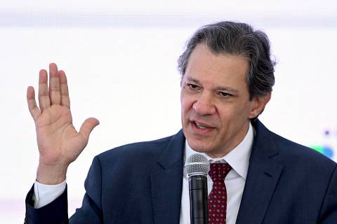 Brazilian Minister of Economy Fernando Haddad speaks during the announcement of support measures for the storm-ravaged state of Rio Grande do Sul at the Planalto Palace in Brasilia on May 9, 2024. Some 400 municipalities have been affected by the worst natural calamity ever to hit the state of Rio Grande do Sul, with hundreds of people injured and more than 160,000 forced from their homes. (Photo by EVARISTO SA / AFP)
