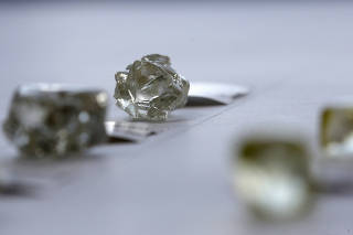 FILE PHOTO: Diamonds are displayed during a visit to the De Beers Global Sightholder Sales (GSS) in the capital Gaborone in Botswana