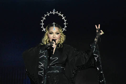 TOPSHOT - US pop star Madonna performs onstage during a free concert at Copacabana beach in Rio de Janeiro, Brazil, on May 4, 2024. . Madonna ended her The Celebration Tour with a performance attended by some 1.5 million enthusiastic fans. (Photo by Pablo PORCIUNCULA / AFP)