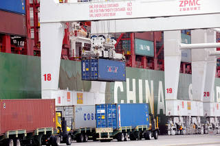 FILE PHOTO: Shipping containers sit at the Port of Long Beach in Long Beach, California